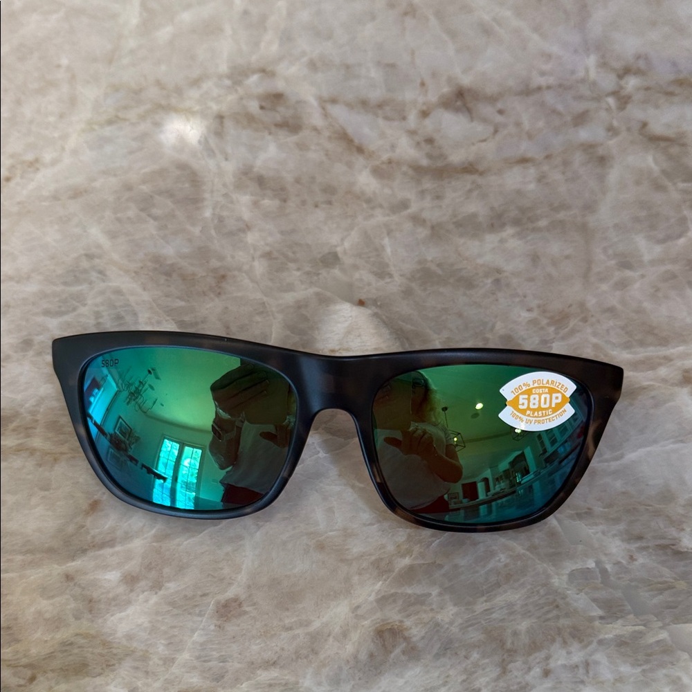 Costa Dark Frame Sunglasses with Vibrant Green Lenses